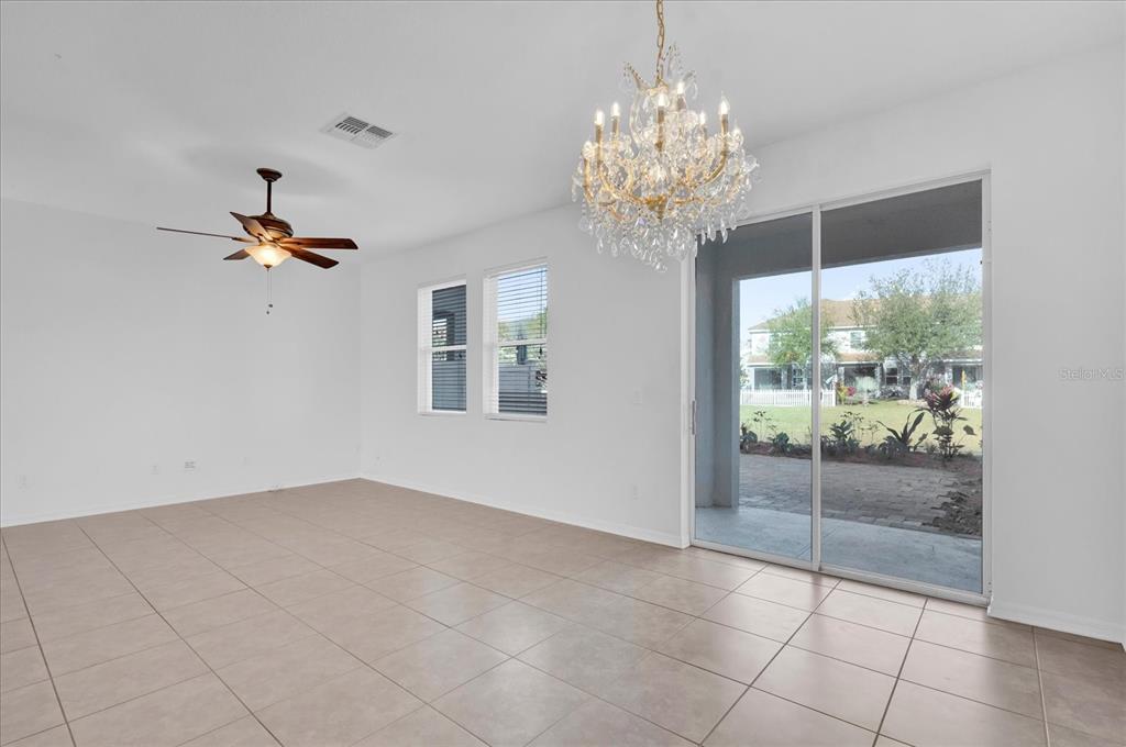 9084 Shepton Street Orlando, FL 32825 - Photo 6 of 26 a very nice looking room with a large window