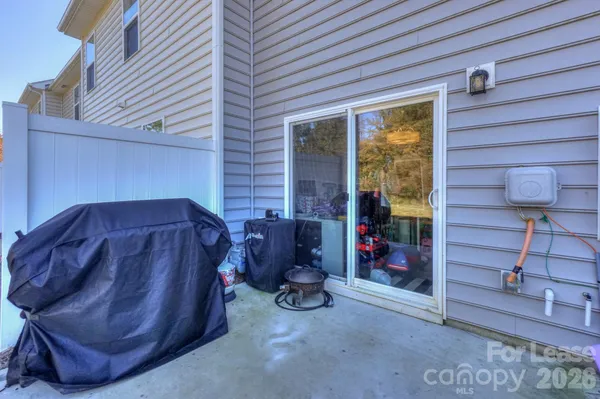 a view of a porch with seating space