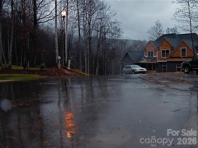 52 Hope View Road Swannanoa, NC 28778 - Photo 14 of 18 a front view of a house with garden