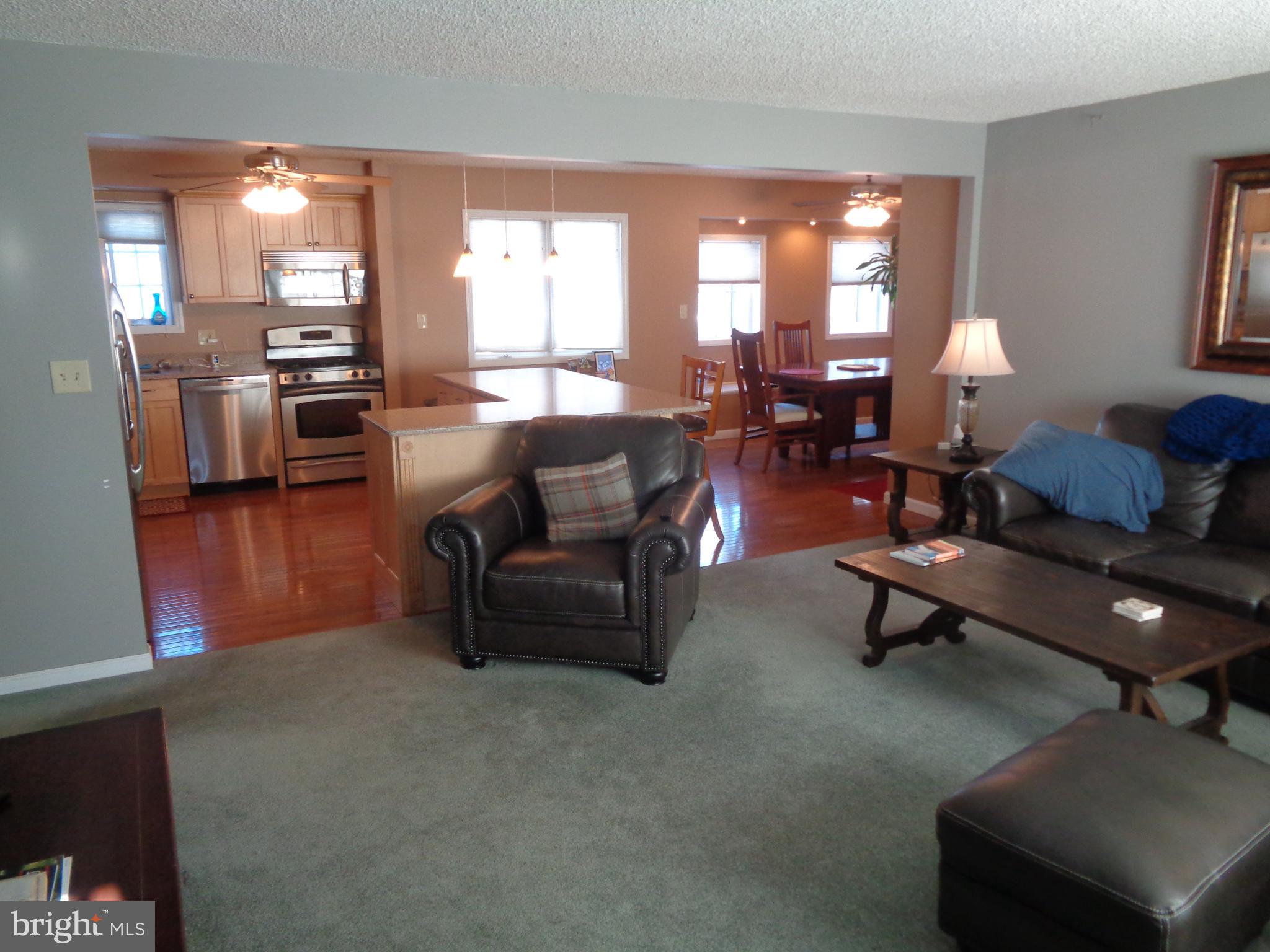 2380 Klockner Road Hamilton, NJ 08690 - Photo 2 of 21 a living room with furniture and a large window