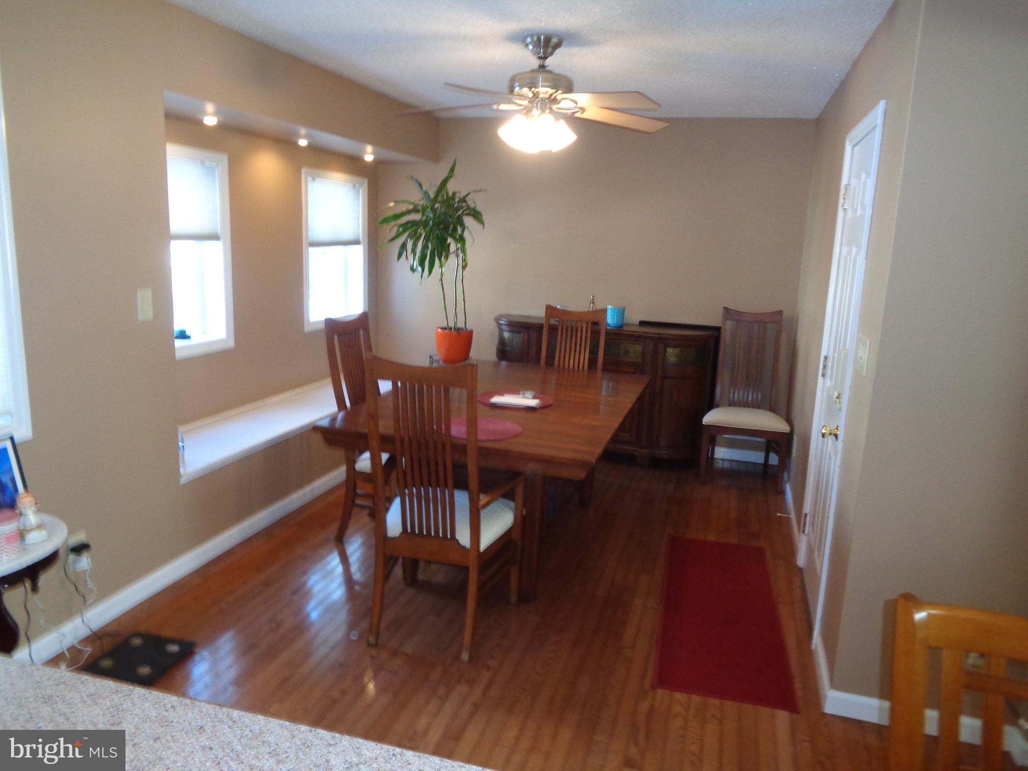 2380 Klockner Road Hamilton, NJ 08690 - Photo 6 of 21 a view of a dining room with furniture and wooden floor