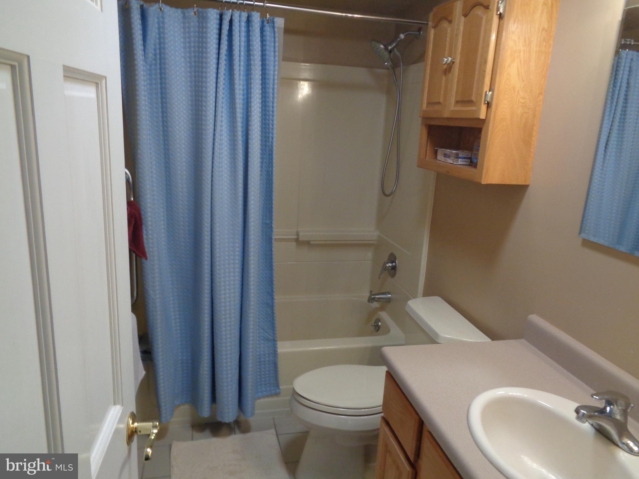 2380 Klockner Road Hamilton, NJ 08690 - Photo 7 of 21 a bathroom with a sink toilet and shower