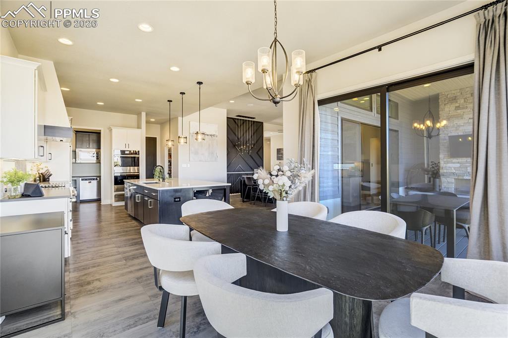 12284 Monarchos Lane Colorado Springs, CO 80921 - Photo 13 of 50 a view of a dining room and livingroom view