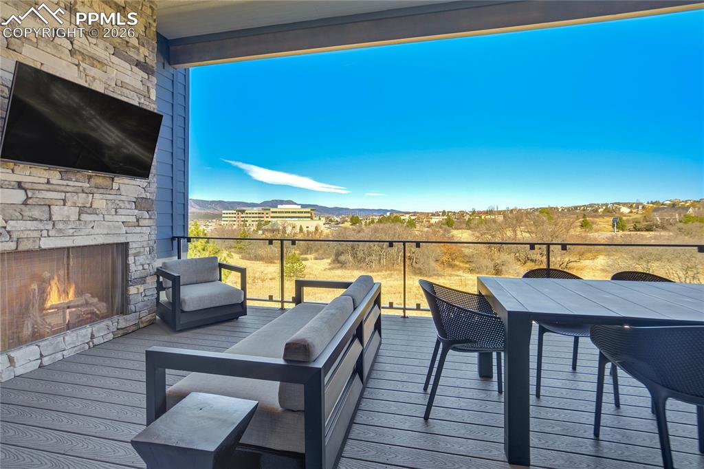 12284 Monarchos Lane Colorado Springs, CO 80921 - Photo 16 of 50 a view of a balcony with an outdoor seating