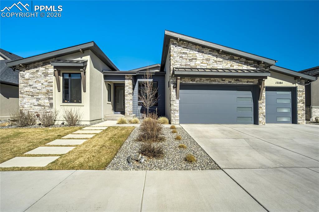12284 Monarchos Lane Colorado Springs, CO 80921 - Photo 2 of 50 a view of a house with small space