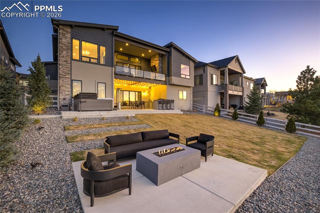 12284 Monarchos Lane Colorado Springs, CO 80921 - Photo 41 of 50 a view of a house with swimming pool and sitting area