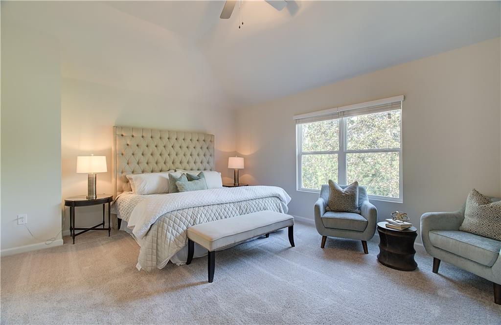 4581 Ajo Walk Atlanta, GA 30331 - Photo 14 of 19 a bedroom with bed couch and window