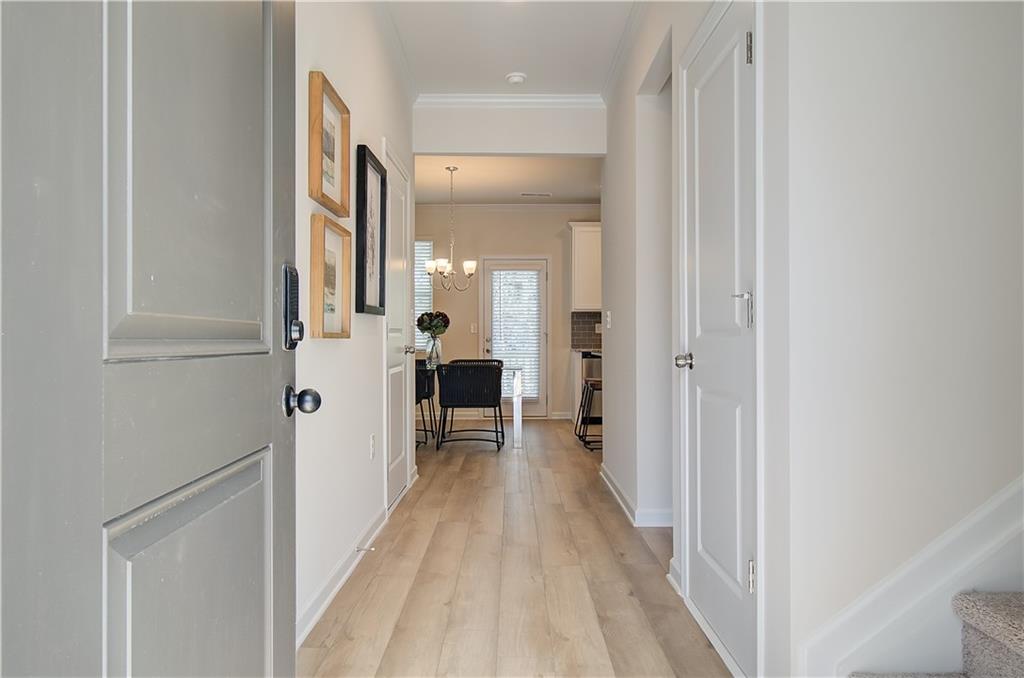 4581 Ajo Walk Atlanta, GA 30331 - Photo 2 of 19 a view of a hallway with a white walls
