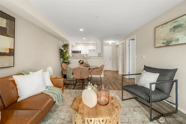 a living room with furniture and a rug