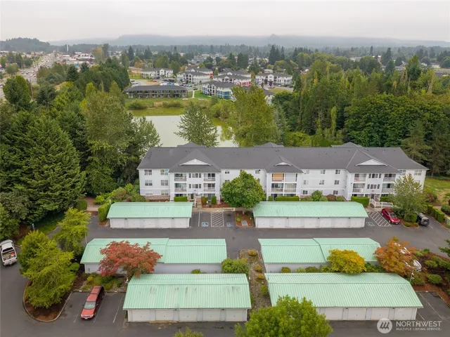 an aerial view of a house with a garden