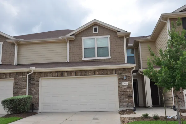front view of a house with a garage