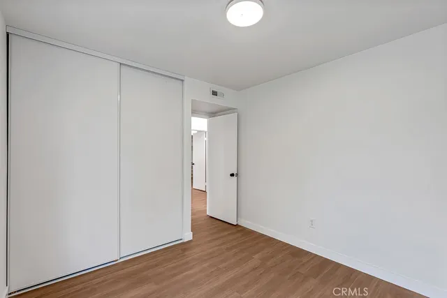 a house view with swimming pool and sitting space