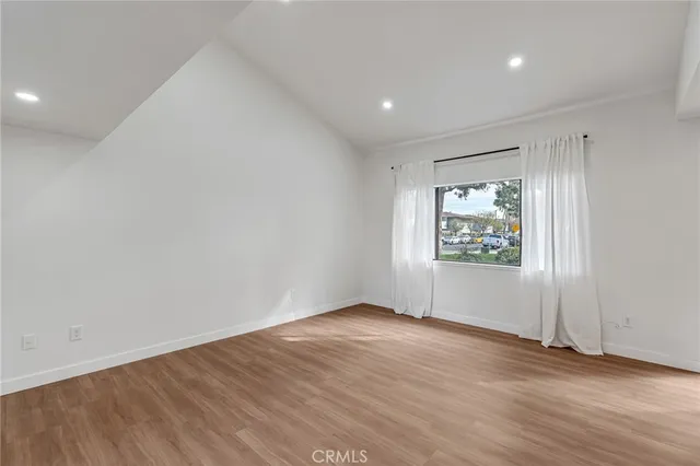 a kitchen with a sink and large window