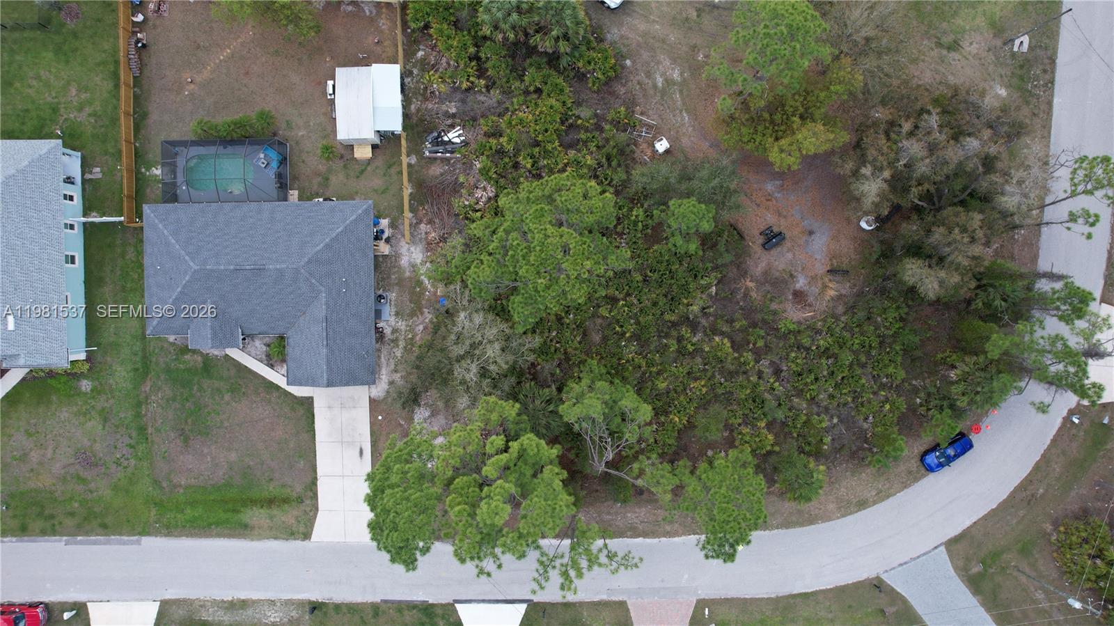 an aerial view of house with yard