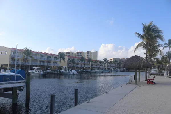 a childrens park with lots of swings and slides