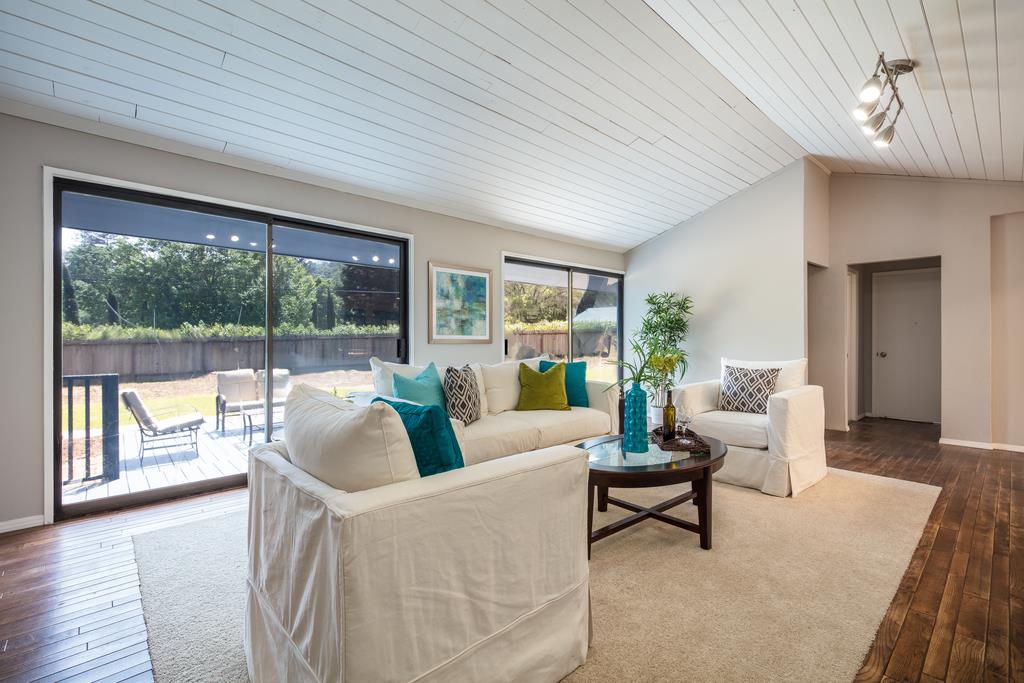 1975 Portola Road Woodside, CA 94062 - Photo 17 of 49 a living room with furniture and a large window