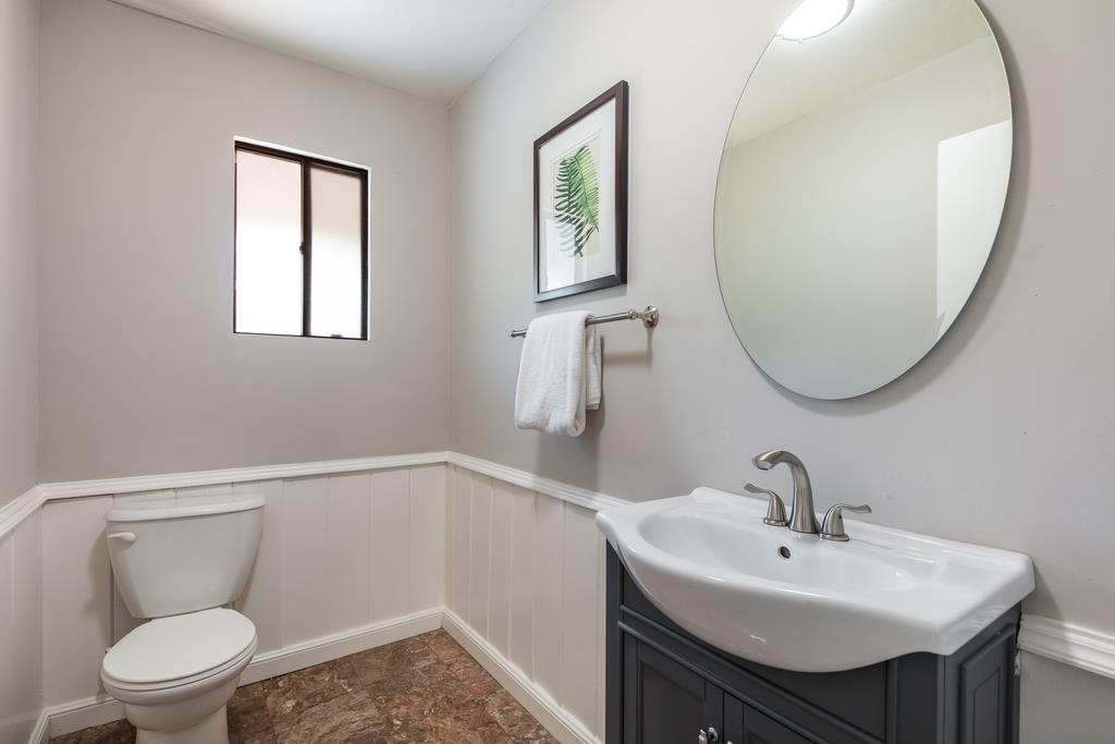 1975 Portola Road Woodside, CA 94062 - Photo 19 of 49 a bathroom with a toilet sink and mirror