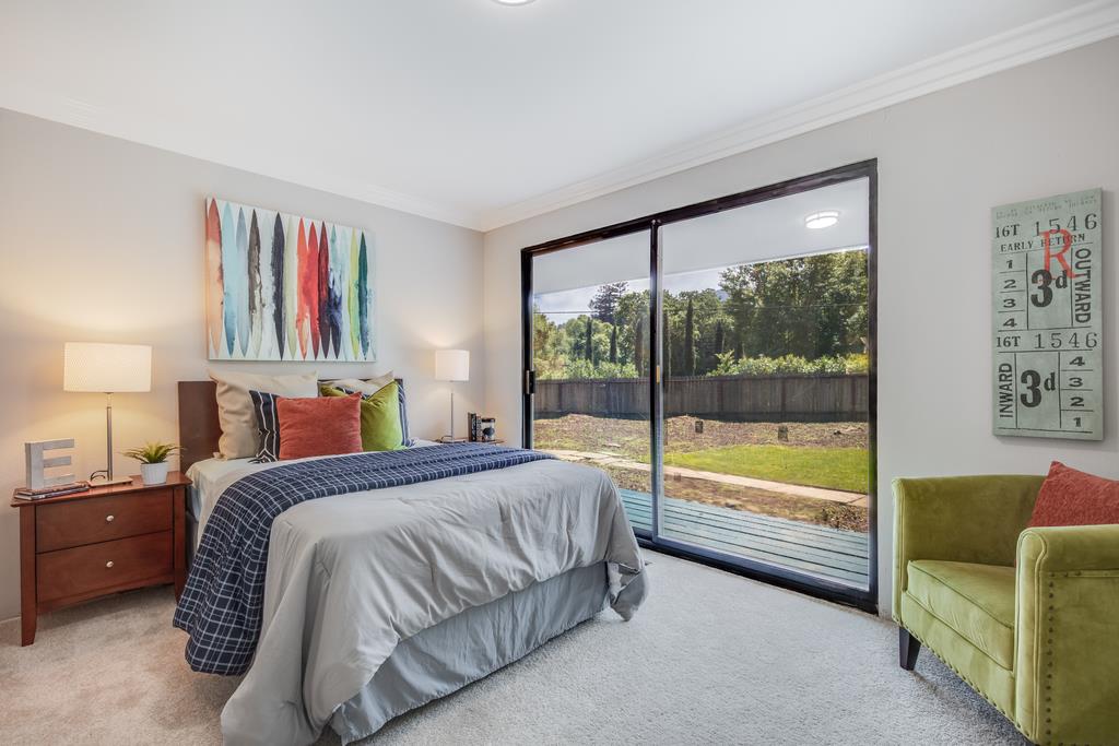 1975 Portola Road Woodside, CA 94062 - Photo 23 of 49 a spacious bedroom with a bed and a large window
