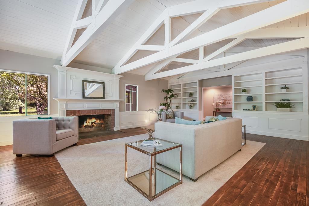 1975 Portola Road Woodside, CA 94062 - Photo 3 of 49 a living room with furniture and a fireplace