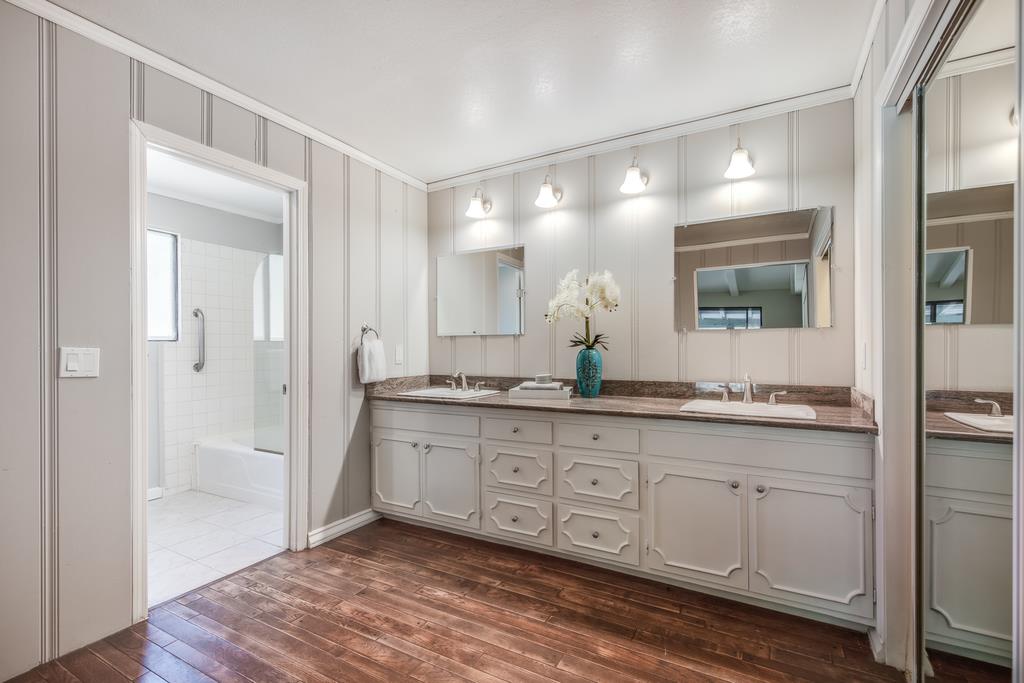 1975 Portola Road Woodside, CA 94062 - Photo 31 of 49 a bathroom with a granite countertop sink mirror and a