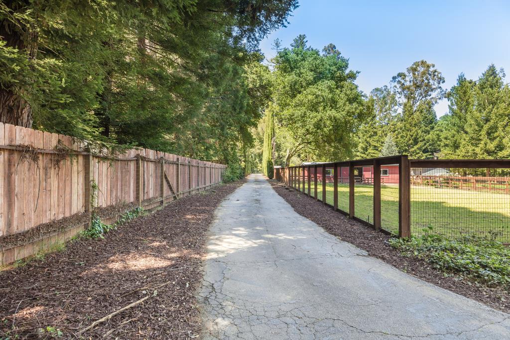 1975 Portola Road Woodside, CA 94062 - Photo 41 of 49 a view of a pathway with a yard