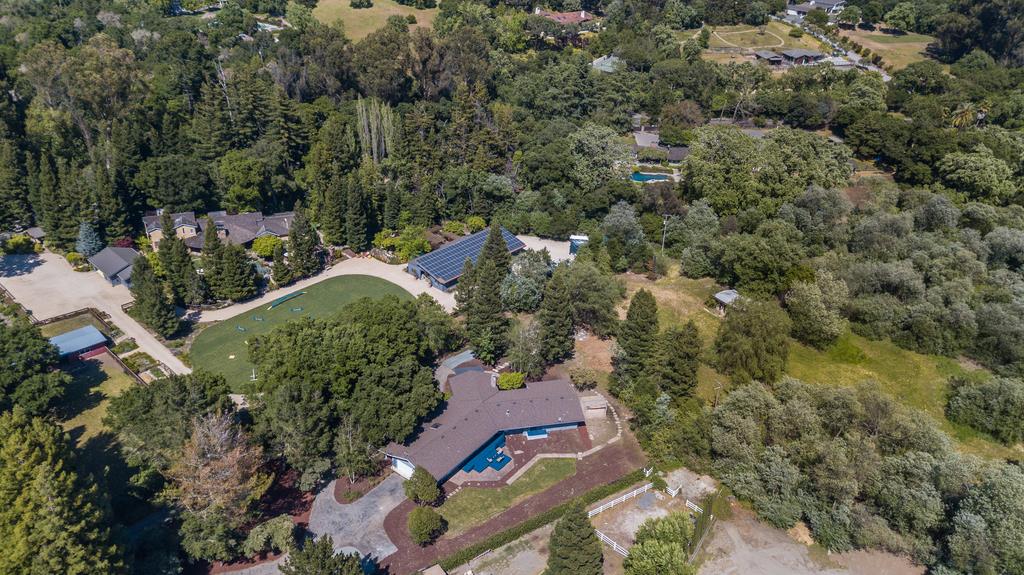 1975 Portola Road Woodside, CA 94062 - Photo 49 of 49 an aerial view of a house with a yard