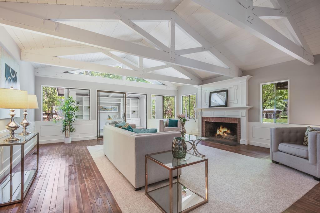 1975 Portola Road Woodside, CA 94062 - Photo 6 of 49 a living room with furniture and a fireplace