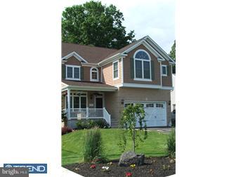 142 Wyndmoor Road Springfield, PA 19064 - Photo 1 of 12 a front view of a house with a yard