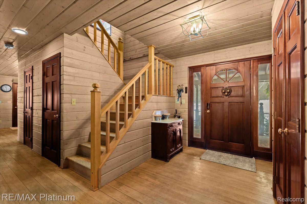 3566 Curdy Road Howell, MI 48855 - Photo 8 of 57 The very welcoming Rock Maple wood surround foyer.