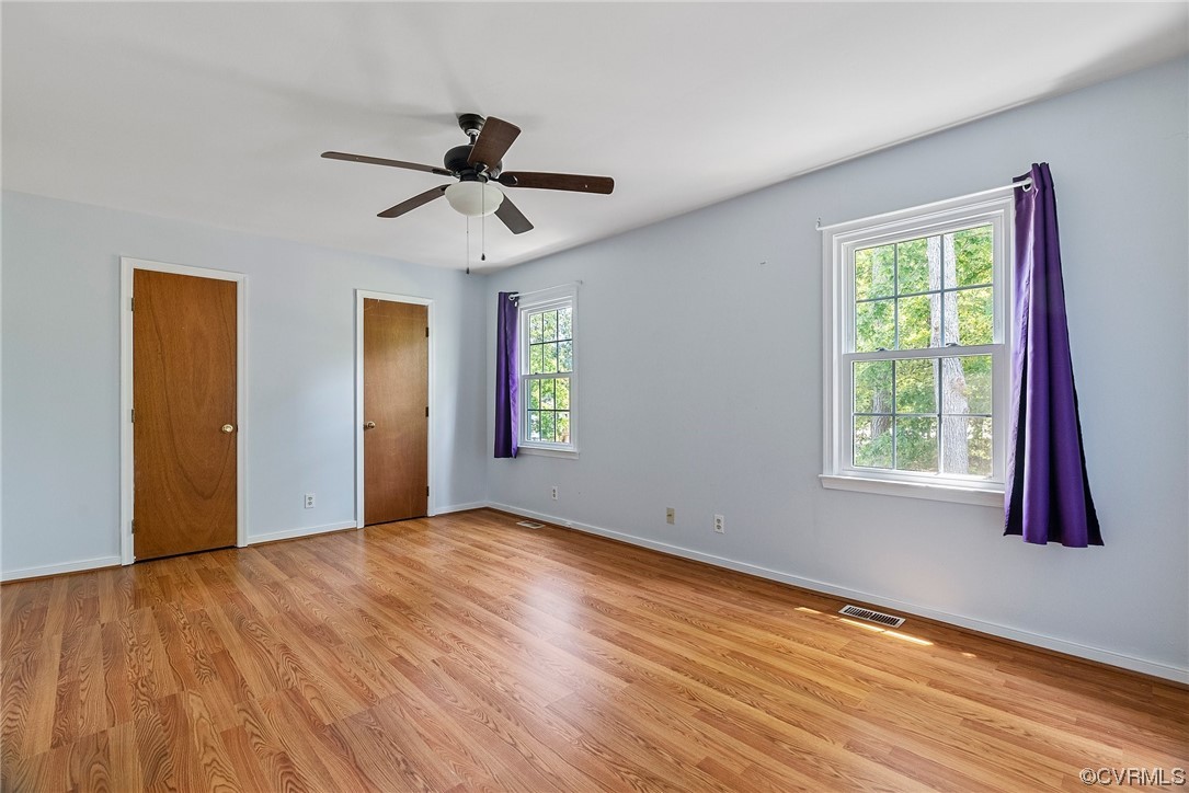 6501 Brambleton Road Chesterfield, VA 23832 - Photo 15 of 18 a view of empty room with wooden floor and fan