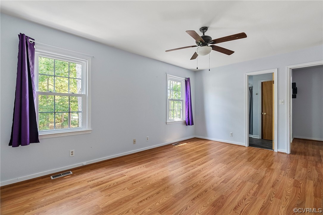 6501 Brambleton Road Chesterfield, VA 23832 - Photo 16 of 18 a view of empty room with wooden floor and fan