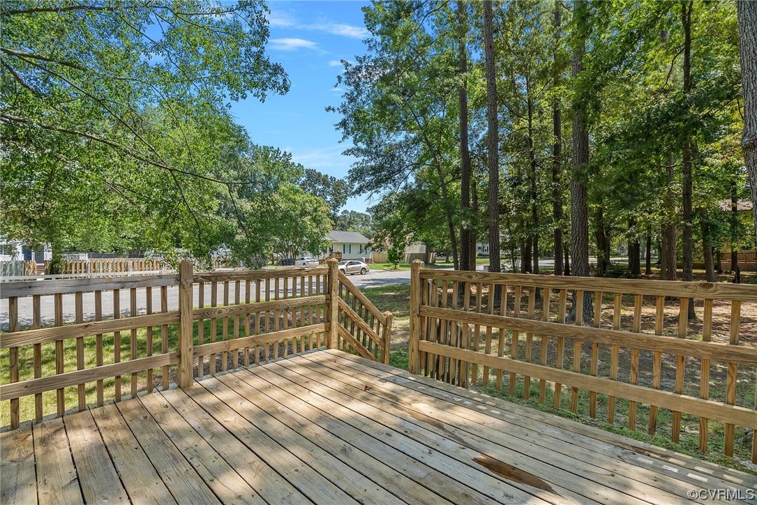 6501 Brambleton Road Chesterfield, VA 23832 - Photo 5 of 18 a view of a deck with wooden floor and fence