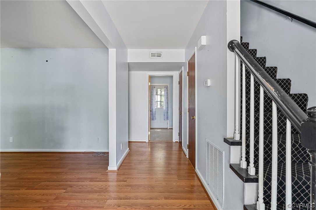 6501 Brambleton Road Chesterfield, VA 23832 - Photo 7 of 18 a view of a hallway with wooden floor