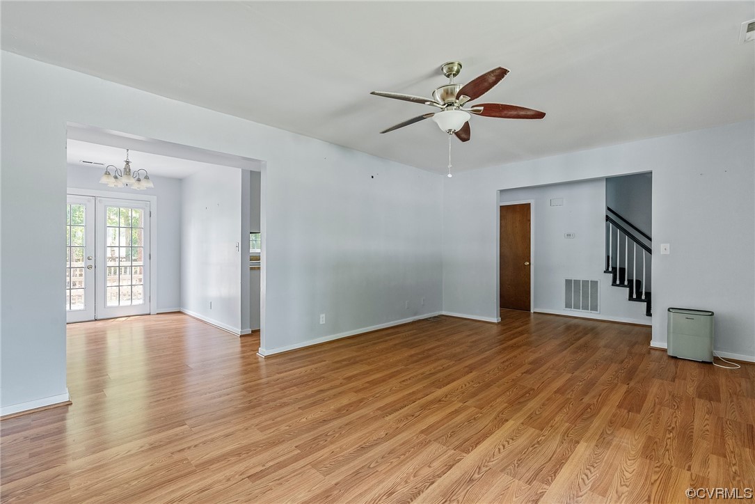6501 Brambleton Road Chesterfield, VA 23832 - Photo 9 of 18 a view of empty room with wooden floor and fan