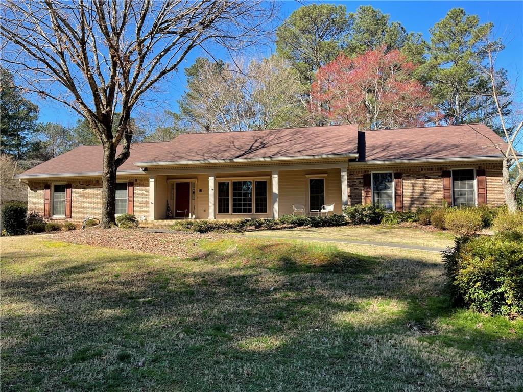 10000 Timberstone Road Alpharetta, GA 30022 - Photo 1 of 1 4 sided brick home with a nice set back from a quiet road.