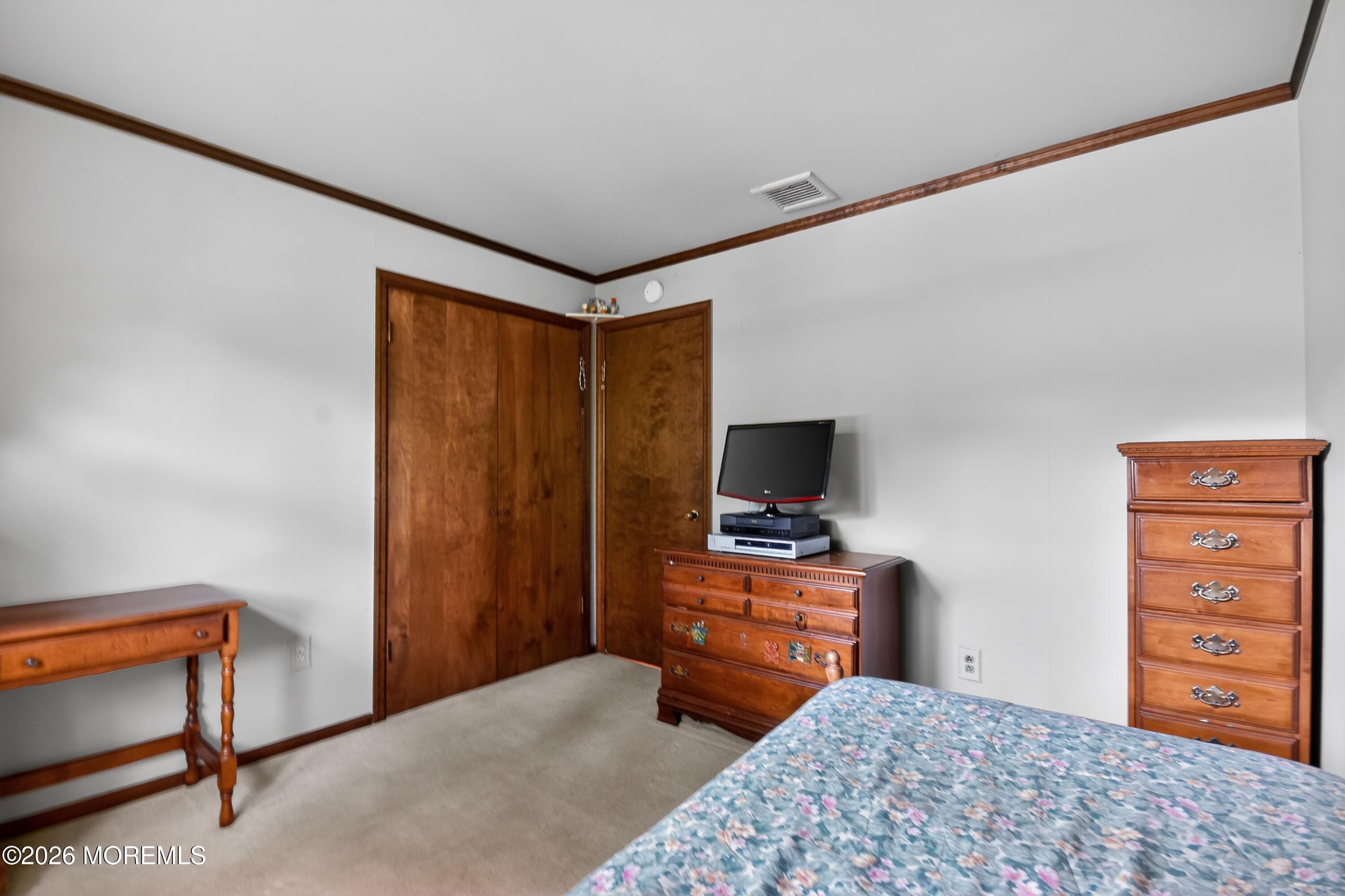 17 Point O Woods Road Middletown, NJ 07748 - Photo 27 of 60 40_17_Point_O_Woods_Rd-Bedroom-0068