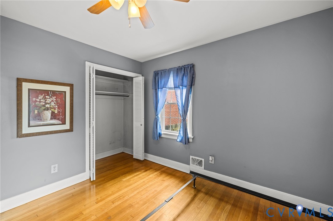 2405 Dumbarton Road Henrico, VA 23228 - Photo 9 of 34 Spacious bedroom with warm wood-finish flooring, n