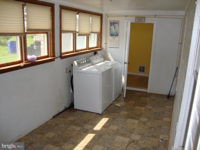 2287 Mullinix Mill Road Mount Airy, MD 21771 - Photo 21 of 28 Front Sun Room/Wash Room