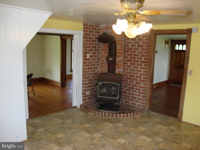 2287 Mullinix Mill Road Mount Airy, MD 21771 - Photo 26 of 28 Entrance to Kitchen With Wood Burning Stove