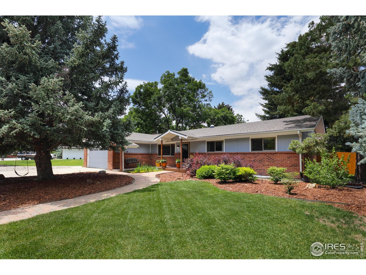 7459 Mt Meeker Road Longmont, CO 80503 - Photo 1 of 37 Front elevation.
