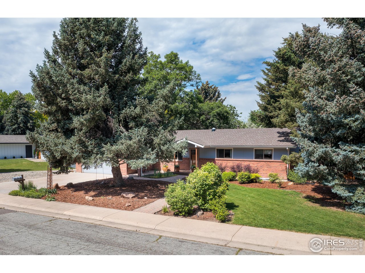7459 Mt Meeker Road Longmont, CO 80503 - Photo 2 of 37 Front elevation.