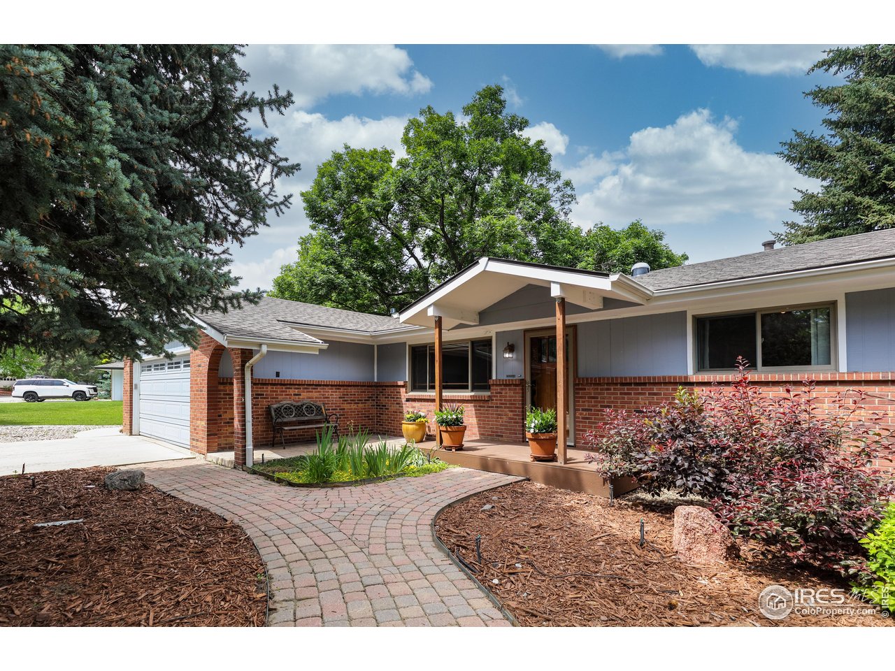 7459 Mt Meeker Road Longmont, CO 80503 - Photo 3 of 37 Front paver patio walk-way!