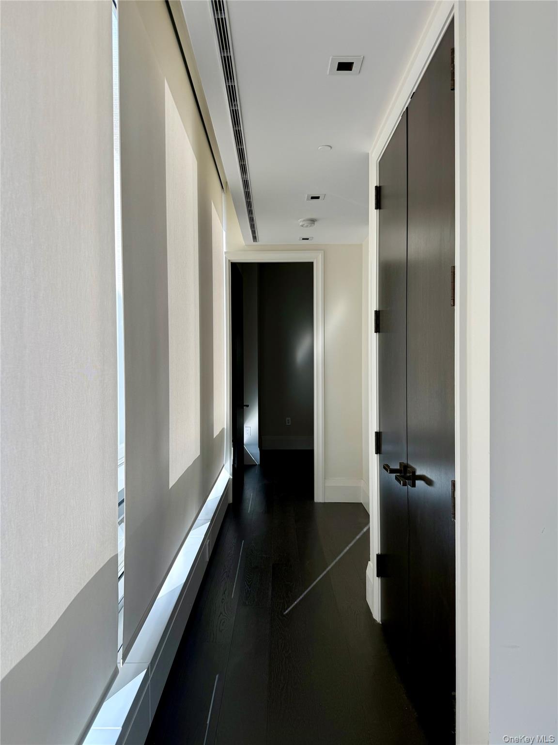 172 Madison Avenue, Unit 17C Manhattan, NY 10016 - Photo 19 of 27 a view of a hallway