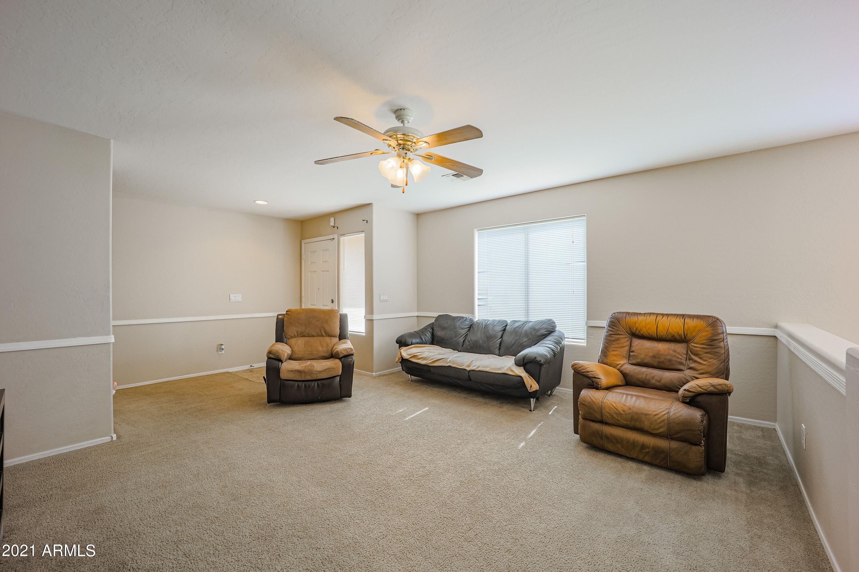 42364 West Venture Road Maricopa, AZ 85138 - Photo 4 of 25 front room 1 venture