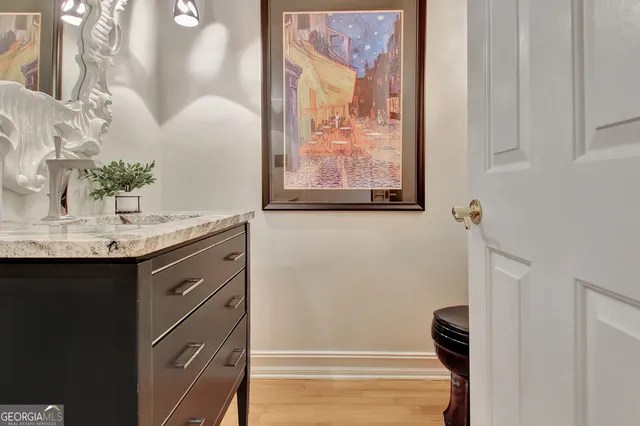 a bathroom with a toilet and a sink