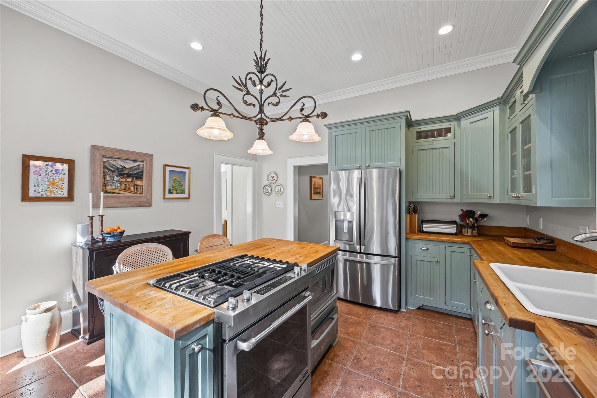 12 Wright Avenue York, SC 29745 - Photo 21 of 29 a kitchen with stainless steel appliances granite countertop a sink a stove a refrigerator cabinets and dining table