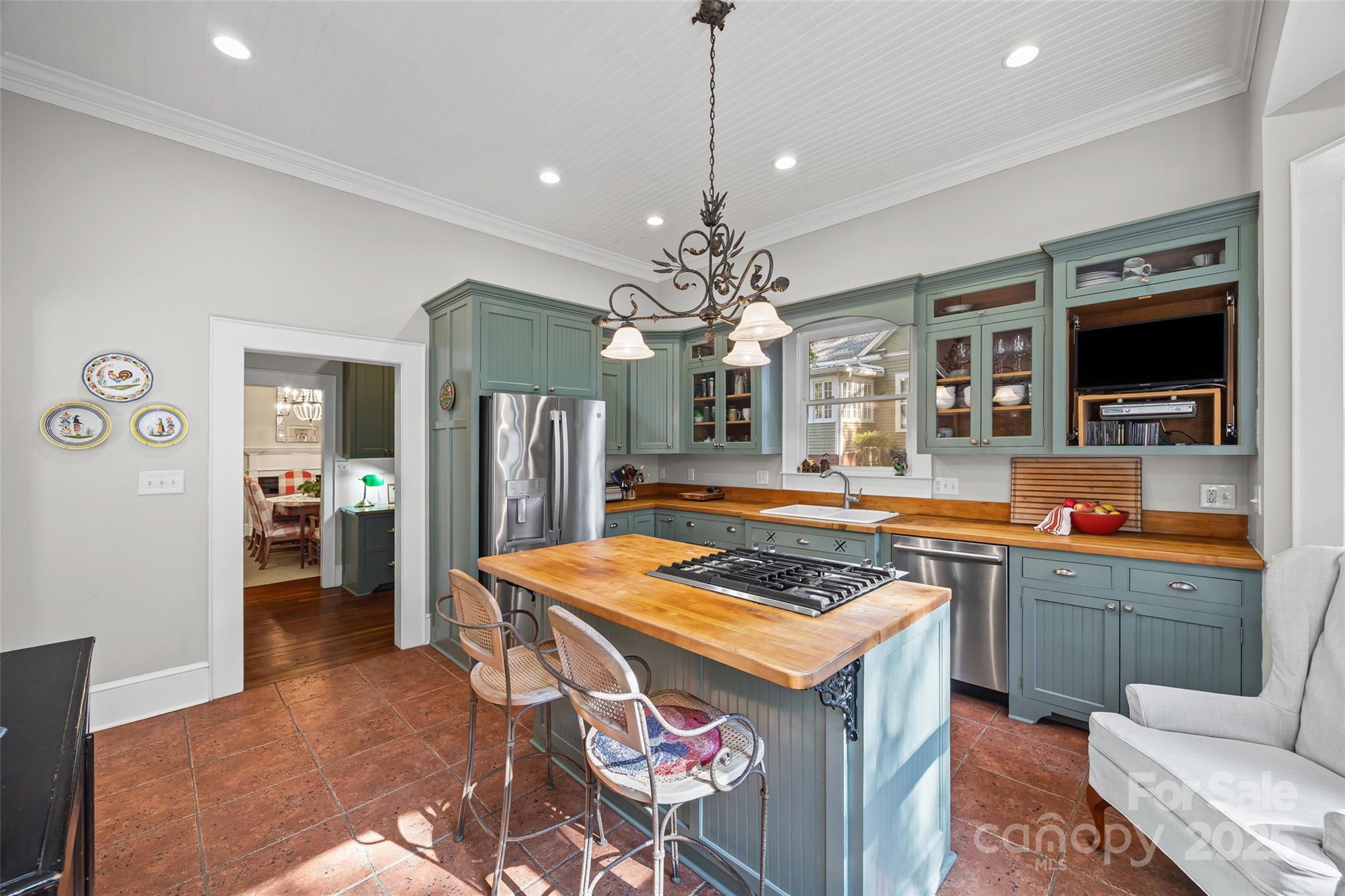 12 Wright Avenue York, SC 29745 - Photo 23 of 29 a kitchen with stainless steel appliances granite countertop a stove a sink a refrigerator and a fireplace