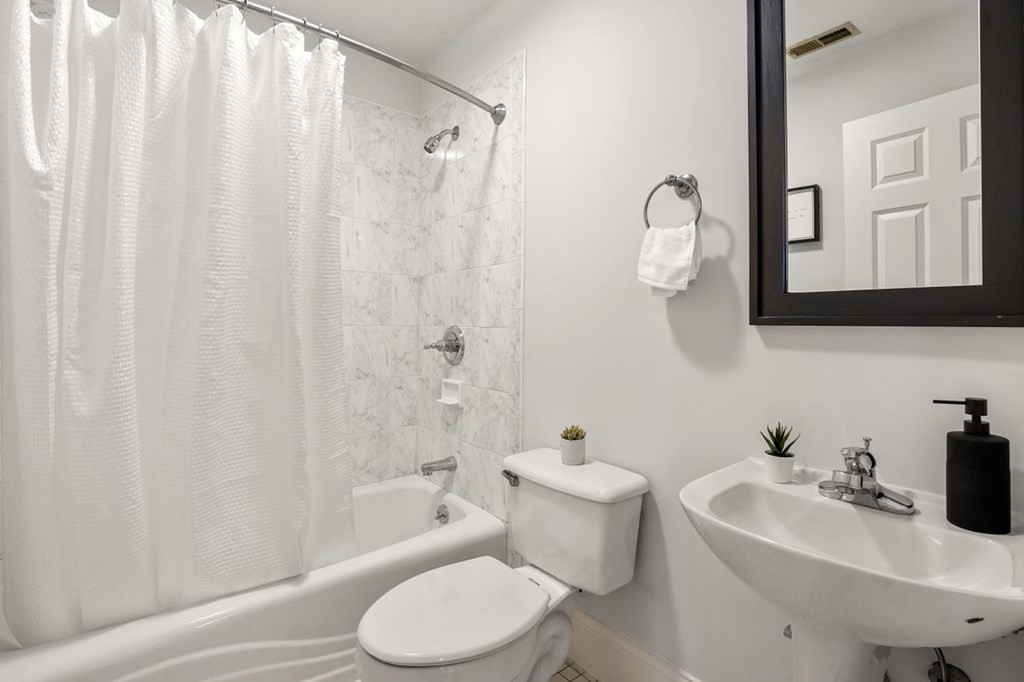 11 Union Street, Unit 2 Boston, MA 02129 - Photo 12 of 22 a bathroom with a sink toilet and shower