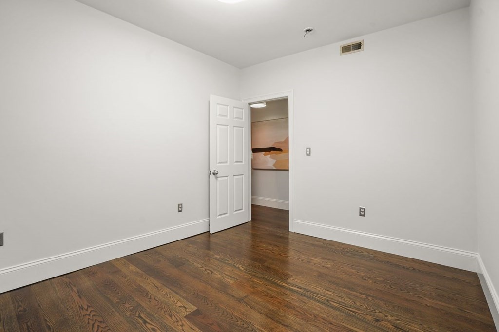11 Union Street, Unit 2 Boston, MA 02129 - Photo 15 of 22 wooden floor in an empty room