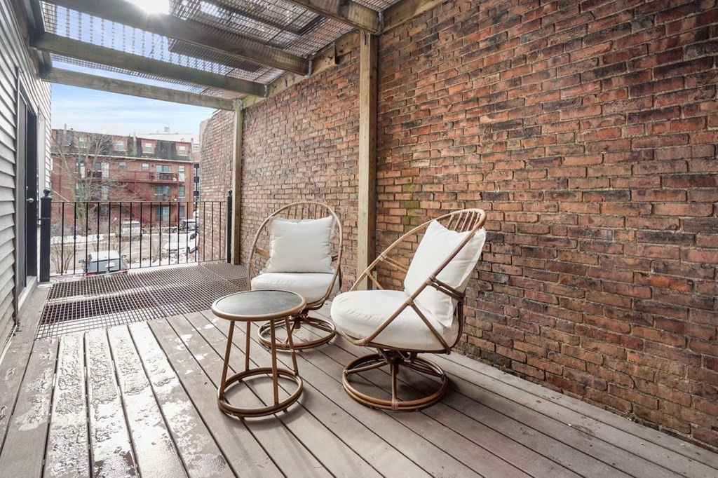 11 Union Street, Unit 2 Boston, MA 02129 - Photo 20 of 22 a view of a chairs and table on the deck